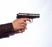 Women's hands holding a Makarov